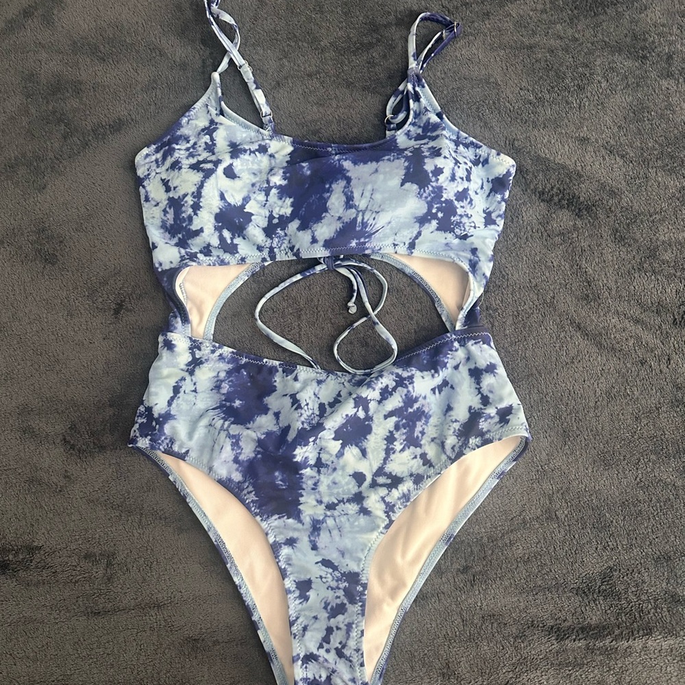 Blue and White One Piece Swim with Artistic Cutouts